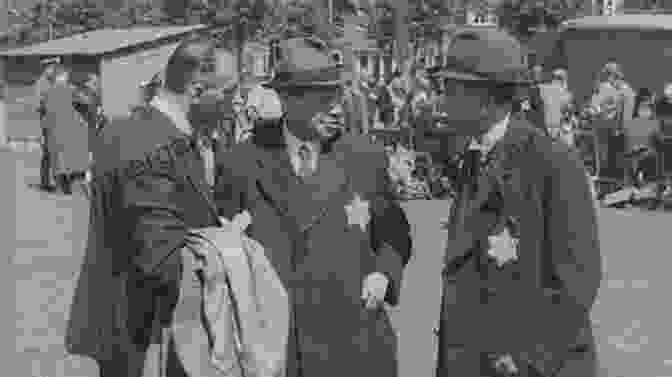 A Black And White Photograph Of Jewish Victims Of The Holocaust, Lined Up And Forced To Walk Through A Concentration Camp. Patriotic Murder: A World War I Hate Crime For Uncle Sam