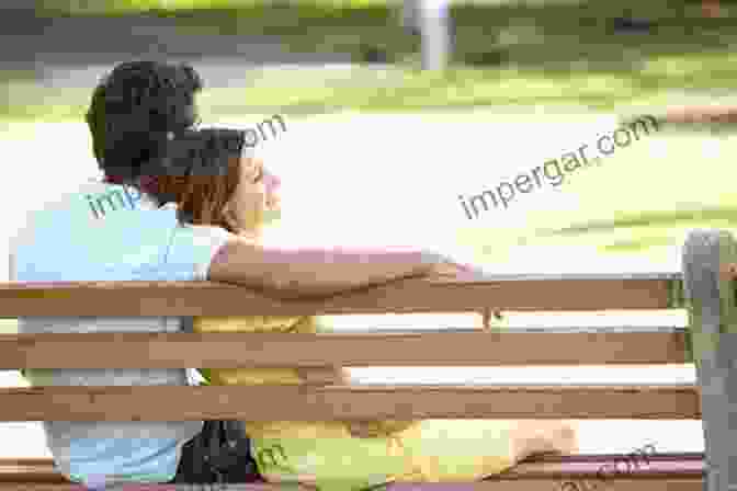 A Couple Embracing On A Park Bench HOW TO WIN HER BACK AND NOT DIE TRYING