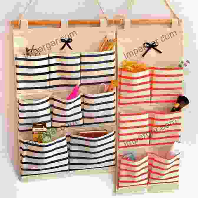 A Hanging Organizer Made Of Striped Fabric, With Multiple Pockets And Compartments, Hanging On A Wall In A Colorful And Organized Craft Room. Home Sewn: Projects And Inspiration For Every Room