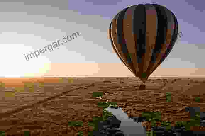 A Hot Air Balloon Floating Over The Vast Serengeti Plains SAVAGE BEAUTY: Heart Pounding Journeys Through Africa With A Camera