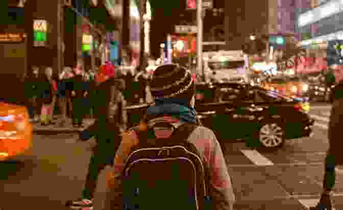 A Person Walking Down A City Street, Paying Attention To Their Surroundings The Secure Urbanite: Personal Security In The Asphalt And Concrete Jungle