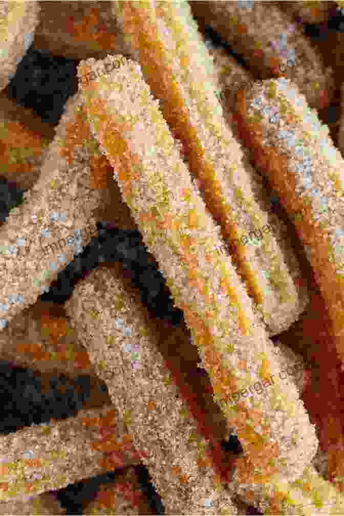 A Tempting Arrangement Of Churros, Freshly Fried And Coated In Cinnamon And Sugar Vegetarian Mexican Cookbook: Over 100 Mouthwatering Recipes To Tamales To Churros For Everyone