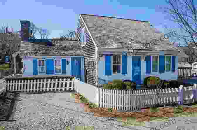 Exterior Of A Picturesque 1920s Cape Cod House, Showcasing A Steeply Pitched Roof And Decorative Shutters. The Most Popular Homes Of The Twenties (Dover Architecture)