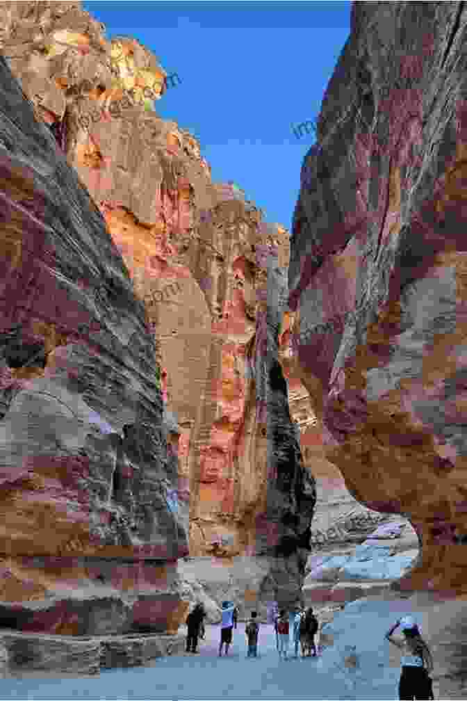 The Siq, A Narrow Gorge Leading To Petra, Lined With Towering Sandstone Walls Petra Jordan: Petra Jordan In Photographs