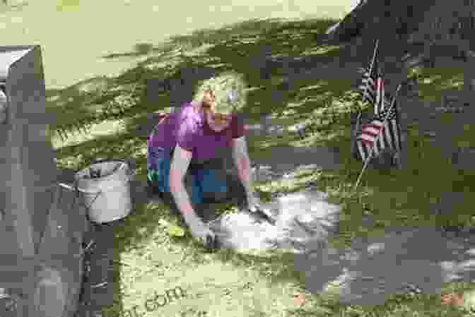 Volunteers Carefully Restoring A Damaged Headstone In A Military Cemetery, Preserving The Memory Of A Fallen Soldier Snake Hill: An Investigation Of A Military Cemetery From The War Of 1812